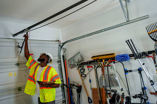 Professional Garage Door Installation technician working in Fayetteville, AR